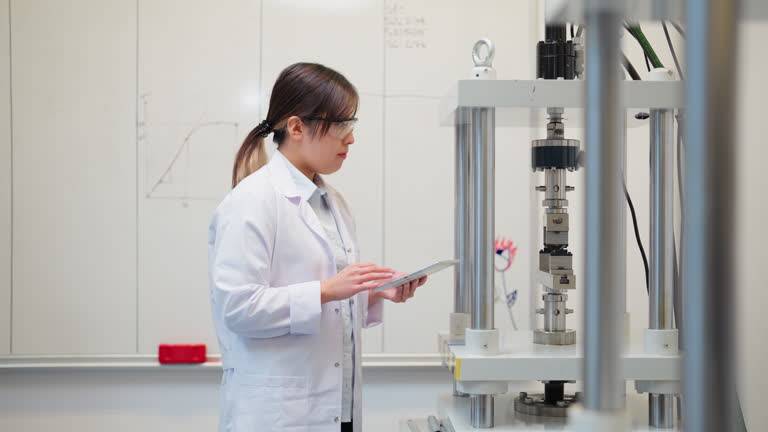 A professional Asian Chinese logistics inspector comparing a printed Certificate of Analysis (CoA) against the labels on a large chemical drum. Diligent, professional, photorealistic.