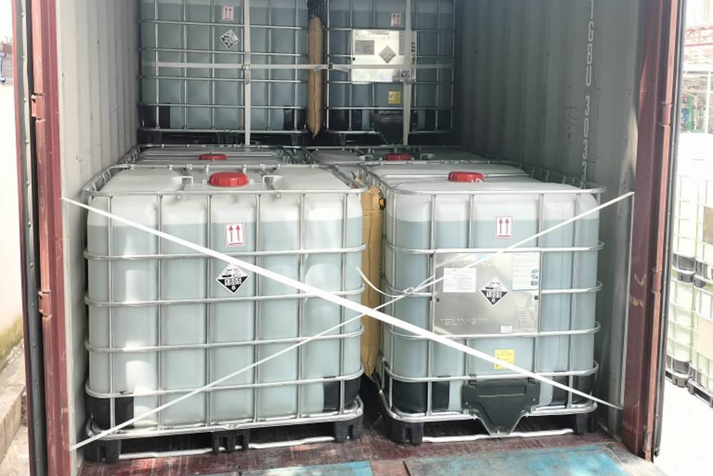 An IBC tote used for packaging bulk phosphoric acid shipments.